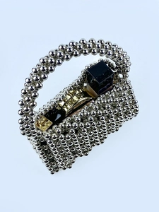 Silver beaded handmade triangle woven shoulder bag with chic metallic hollow flap design