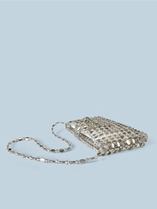 Detailed macro view of silver sequin beaded handbag with metallic beads and chain strap