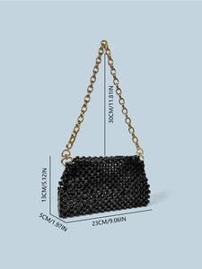 Handgefertigte schwarze Perlenhandtasche mit 3D-Struktur und goldener Kette