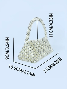 Handmade white pearl beaded trapezoid handbag with dimensions on blue background