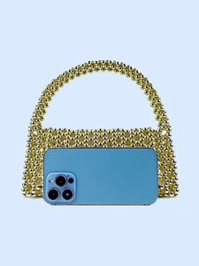 Handmade gold beaded mini handbag with top handle showing large smartphone capacity