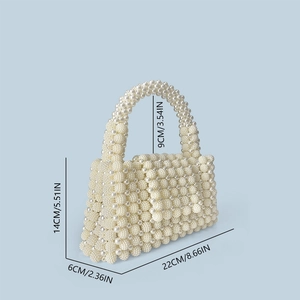 Detailed view of handmade white pearl woven handbag with precise dimensions shown