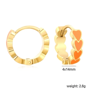 Detail view of 4x14mm orange enamel heart earrings with polished gold-plated finish
