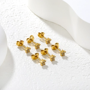 Set of three pairs of golden star flower earrings with 18K finish and inlaid rhinestones