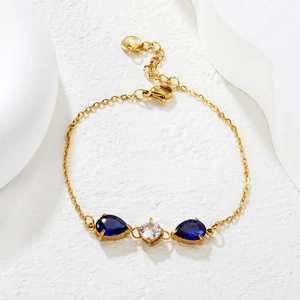 18k gold plated stainless steel bracelet featuring pear-cut blue zircon and O-chain