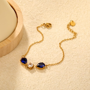 Luxurious 18K gold-plated stainless steel bracelet with blue and white teardrop zircons