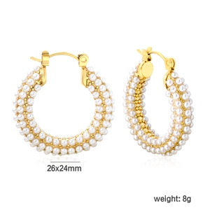 Detail view of gold hoop earrings with white pearls, size 26x24mm and weight 8g