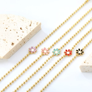 Colorful daisy enamel bracelets with gold bead chains in five vibrant summer colors