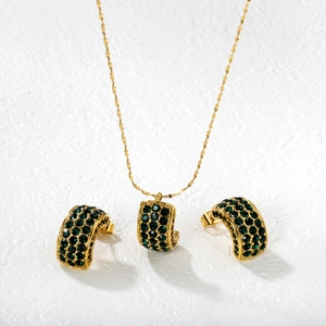 Luxury gold necklace and semicircle earrings set with emerald green cubic zirconia