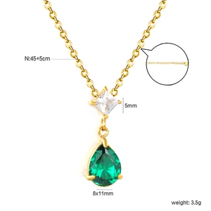 Detail showing 45+5cm gold necklace with square white and pear-shaped green stones