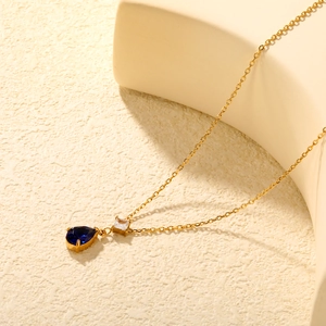 Elegant gold chain necklace with waterdrop dark blue stone and white zircon pendant