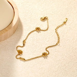 18K gold plated stainless steel anklet featuring delicate seven-petal flower charms