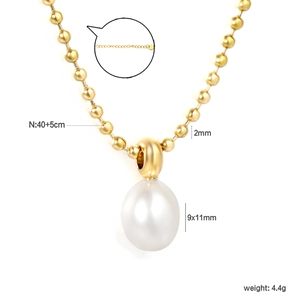 Detail of gold bead necklace with lustrous oval pearl and adjustable S925 lobster clasp