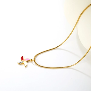 Golden stainless steel necklace with colorful windmill pendant and sparkling white crystals