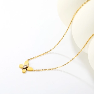 Minimalist 18K gold plated butterfly necklace with marquise zircon on white background