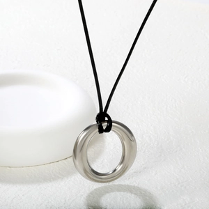 Minimalist silver polished round pendant on thin black wax rope necklace for women