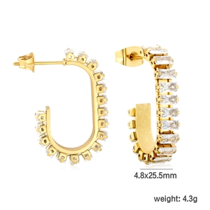 Detailed view of C-shaped gold earrings with rectangular white zircons 4.8x25.5mm