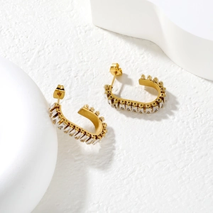 Gold plated C-shape hoop earrings with rectangular cubic zirconia inlays on white background