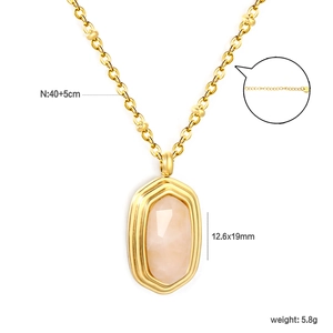 Detail of gold geometric necklace with pink quartz pendant and 40+5cm beaded chain link