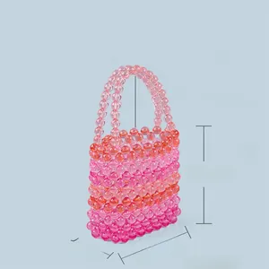 Detail view of handmade rainbow beaded bag with pink and orange transparent acrylic beads