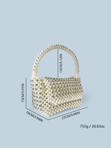 Detailed view of handmade pearl handbag with dimensions 23x15x10cm and crystal accents
