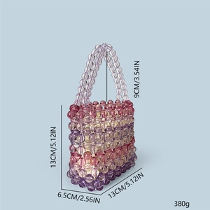 Detailed view of handmade beaded handbag with purple and pink gradient acrylic beads