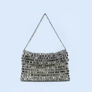 Detail view of silver sequin woven evening bag with reflective metallic disc finish