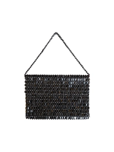 Detail of handmade black sequin bag featuring metallic ring linked chainmail texture