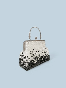 Handmade woven beaded handbag with black and white gradient and vintage metal handle