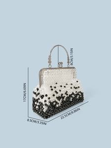 Handmade woven bead handbag with black and white gradient pattern and vintage metal handle