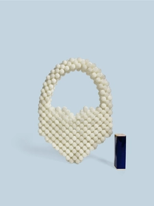 Mini beige beaded heart handbag with top handle and woven pearl texture