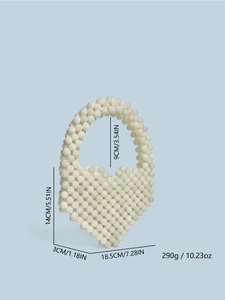 Detailed view of handmade beaded heart-shaped handbag with measurements and weight specifications