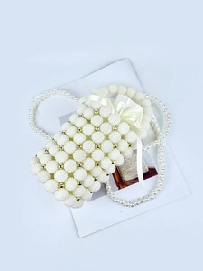 Elegant white pearl woven handbag with gold beads, satin bow and long strap