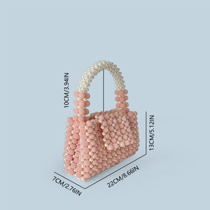 Detailed size specifications for the pink pearl beaded handbag in centimeters and inches