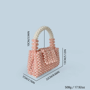 Detail view showing dimensions of handmade pink and white beaded woven handbag with pearl handle