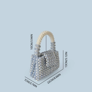 Detailed view of beaded handbag dimensions measuring 22cm wide and 13cm high with pearls