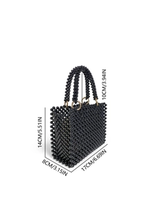 Detail view of handmade black beaded handbag with precise size measurements in inches