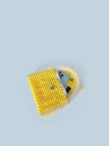 Handmade yellow beaded box bag with white pearls and internal view of storage capacity