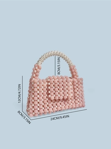Handmade pink beaded handbag with white pearl accents and dimensions displayed