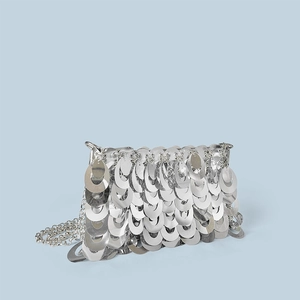 Detail view of silver sequin chain bag featuring glossy layered oval metallic scales