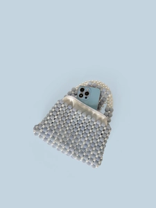 Ice blue handcrafted beaded handbag with silk lining and round beaded handle