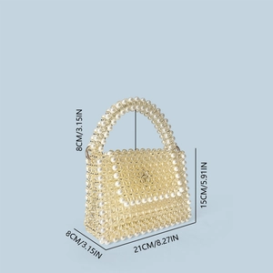 Detail of handmade beaded handbag with 21cm x 15cm x 8cm size specifications