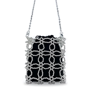 Detail of silver beaded hollow frame with a black drawstring pouch and metal chain