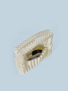 Handmade pearl beaded tote bag in creamy white with inner lining and zipper closure