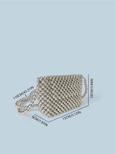 Silver beaded mini crossbody bag with metal chain strap and size dimensions
