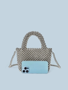 Silver bead woven handbag with metallic finish, crossbody strap and mini size reference