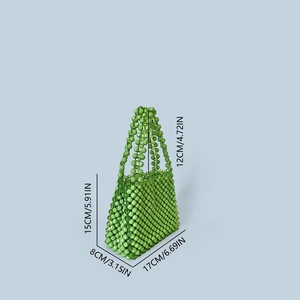 Detail view of green beaded handbag with size dimensions 17x15x8 cm in retro style