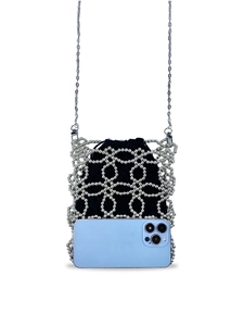 Silver beaded geometric hollow phone bag with black pouch and metal chain on white background