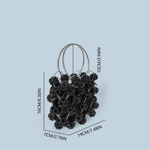 Detail of black beaded handbag with silver metal rings and precise size measurements