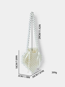 White heart-shaped pearl beaded handbag with satin lining and dimensions displayed